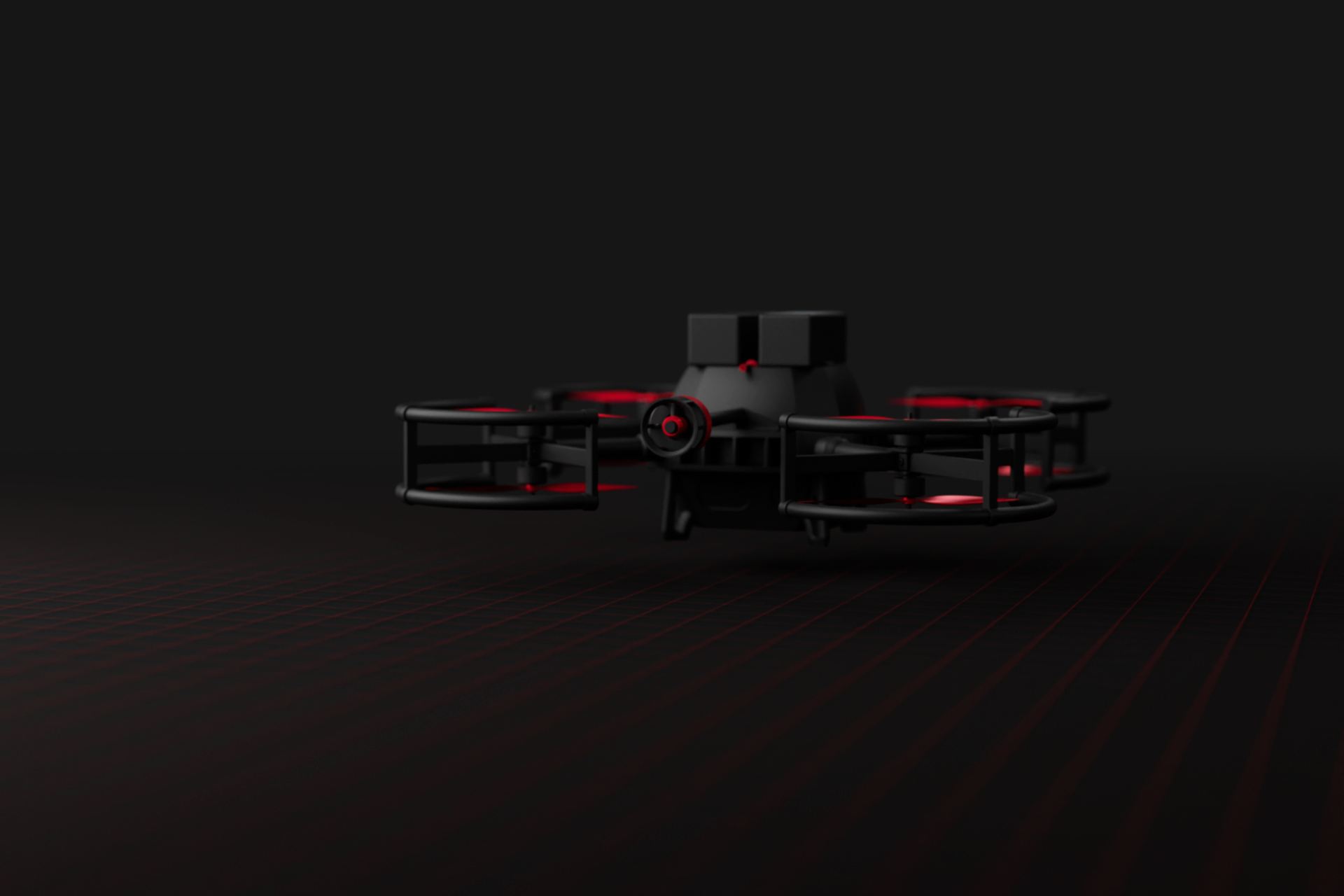 The exDRONE, rendered against an anthracite-colored background, hovering over a red grid. The drone itself is also dark gray, with a few red elements, such as the rotor blades.